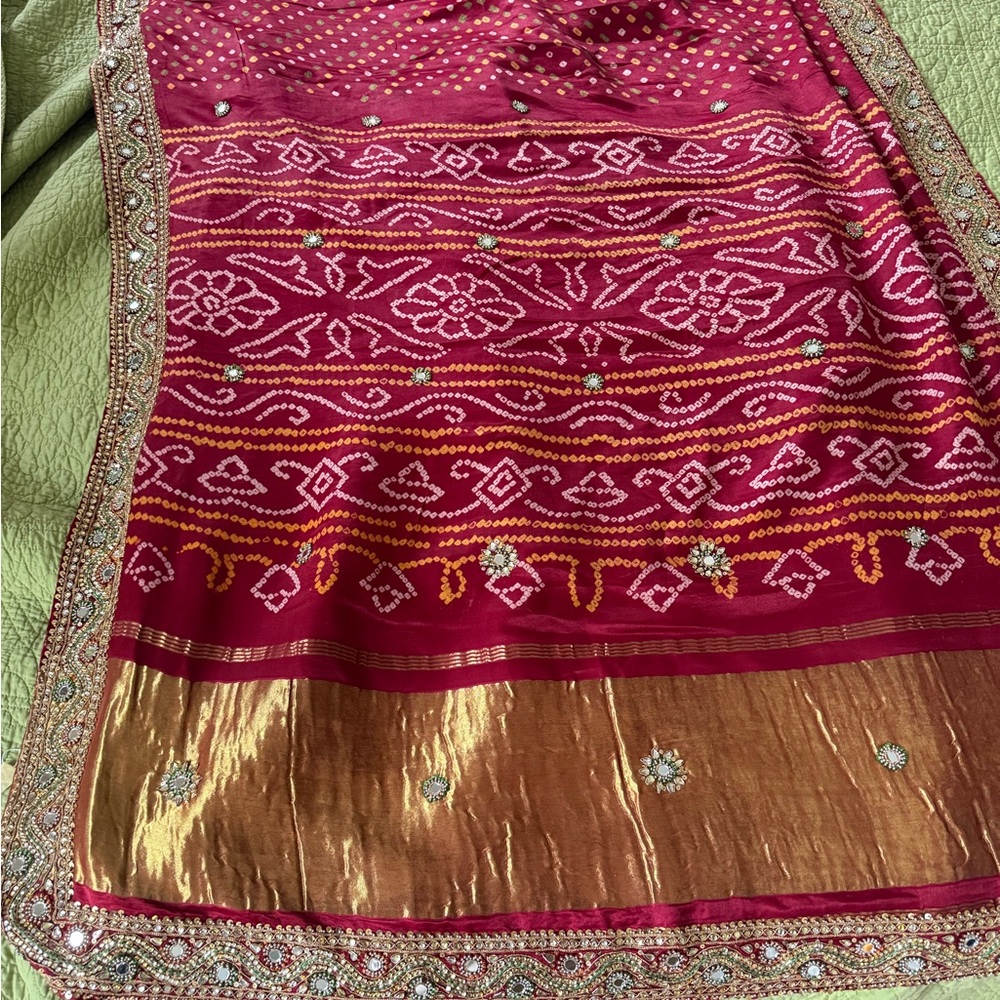 Red and gold hand embroidered hand tied bandhani saree in pure silk
